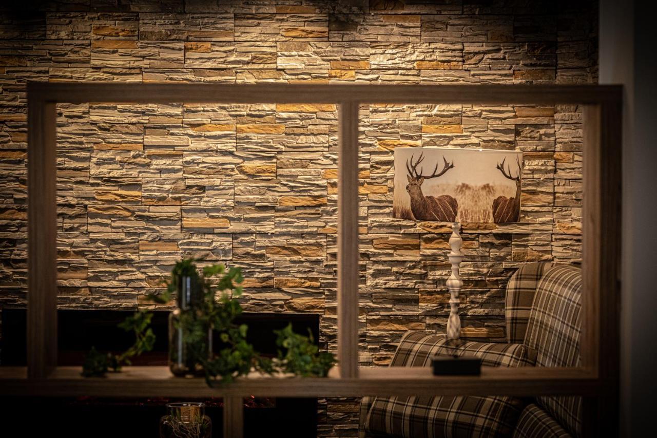 Home-Hotel Salzberg Berchtesgaden Exterior photo A stone wall